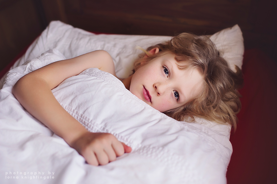 beautiful boy in his bed