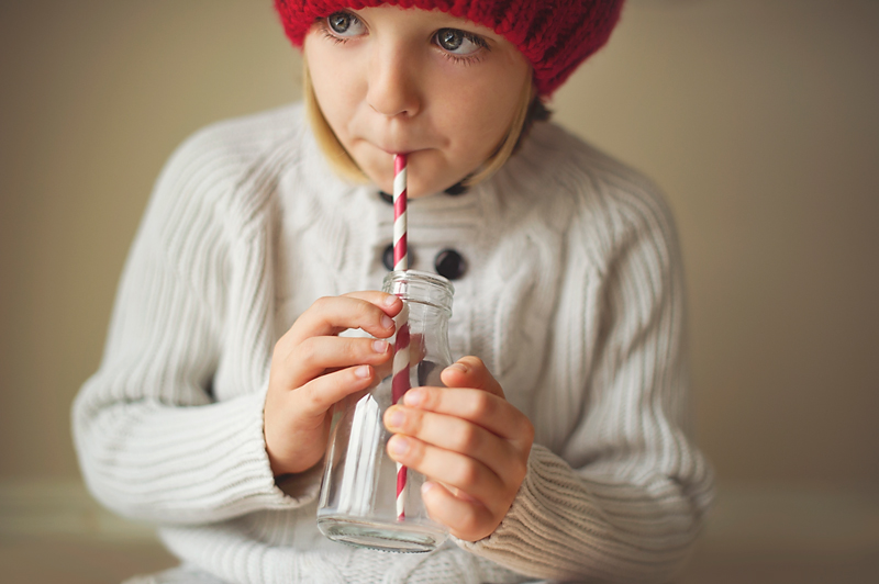 boy_milk_empy_bottle_photography